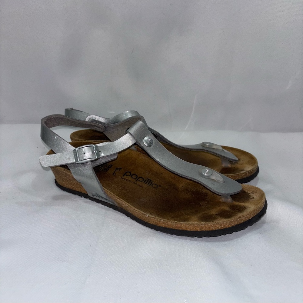 Papillio Women's Ashley Ankle Strap Thong Sandal in metallic silver